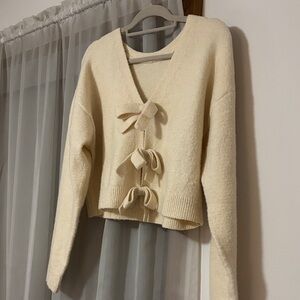 Elegant Cream V-Neck Sweater with Bow Accents